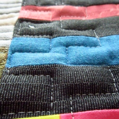 charcoal grey, shocking pink,petrol blue striped quilted cloth for wearable art handbags.